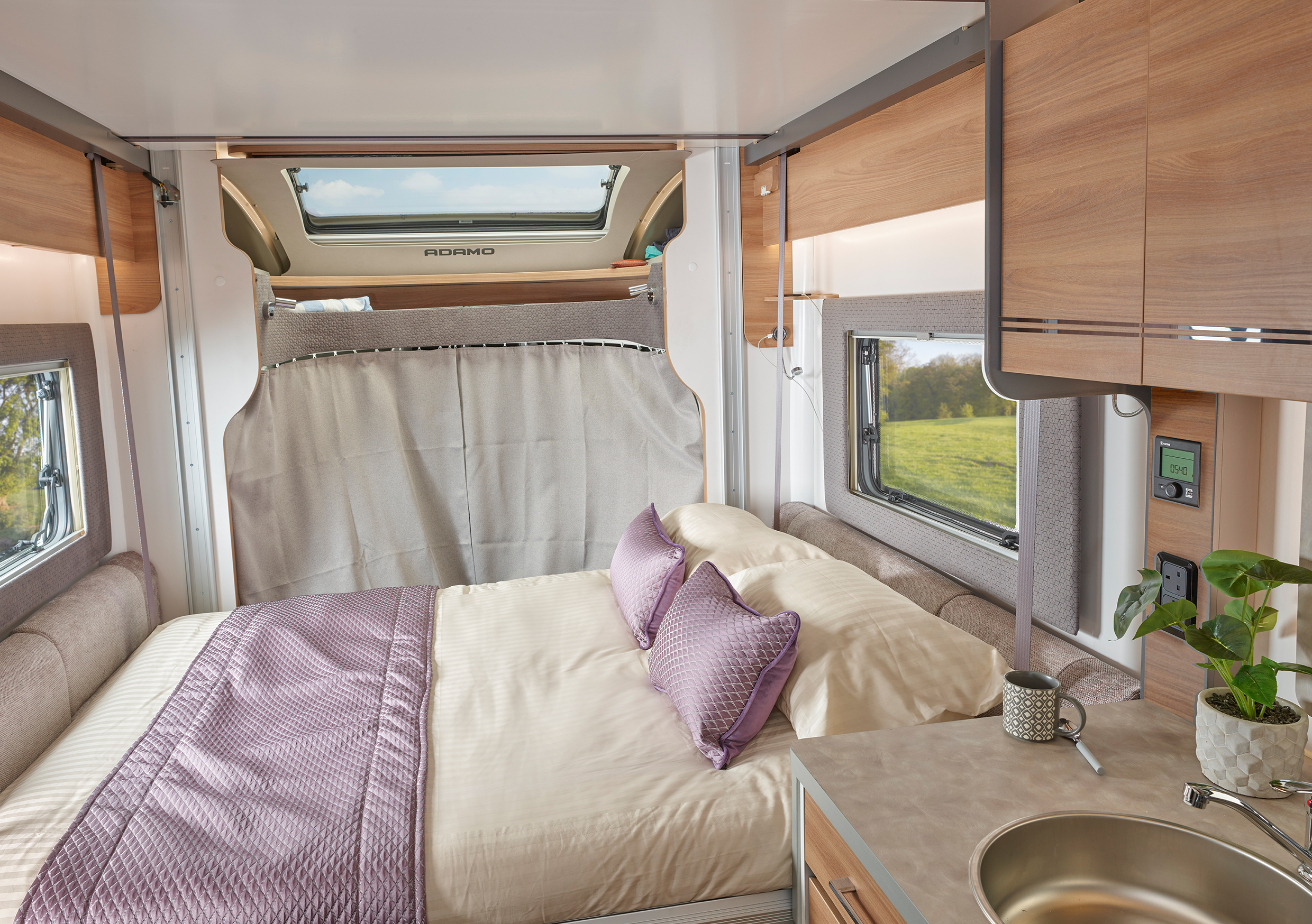 Adamo 69-4 front lounge electric drop down bed