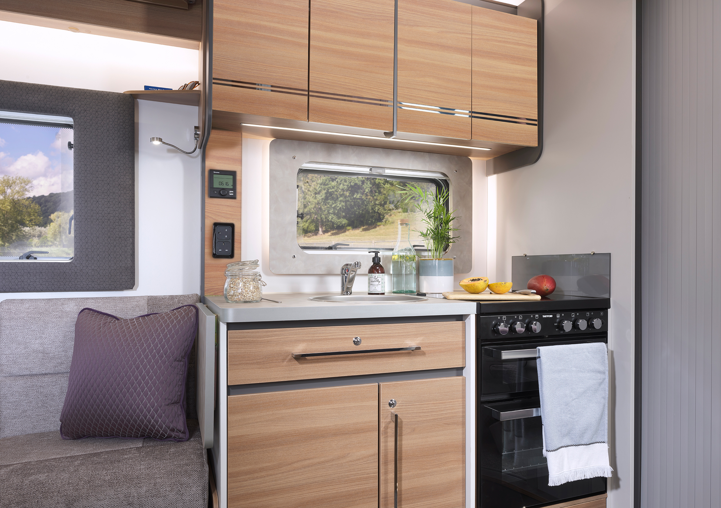Adamo 69-4 kitchen featuring Thetford 'K-series' combined oven, grill and hob