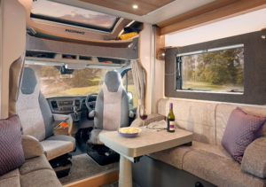 Adamo 75-4DL flexi lounge, featuring twin aguti convertible travelling seats and electric pedastal table (1)