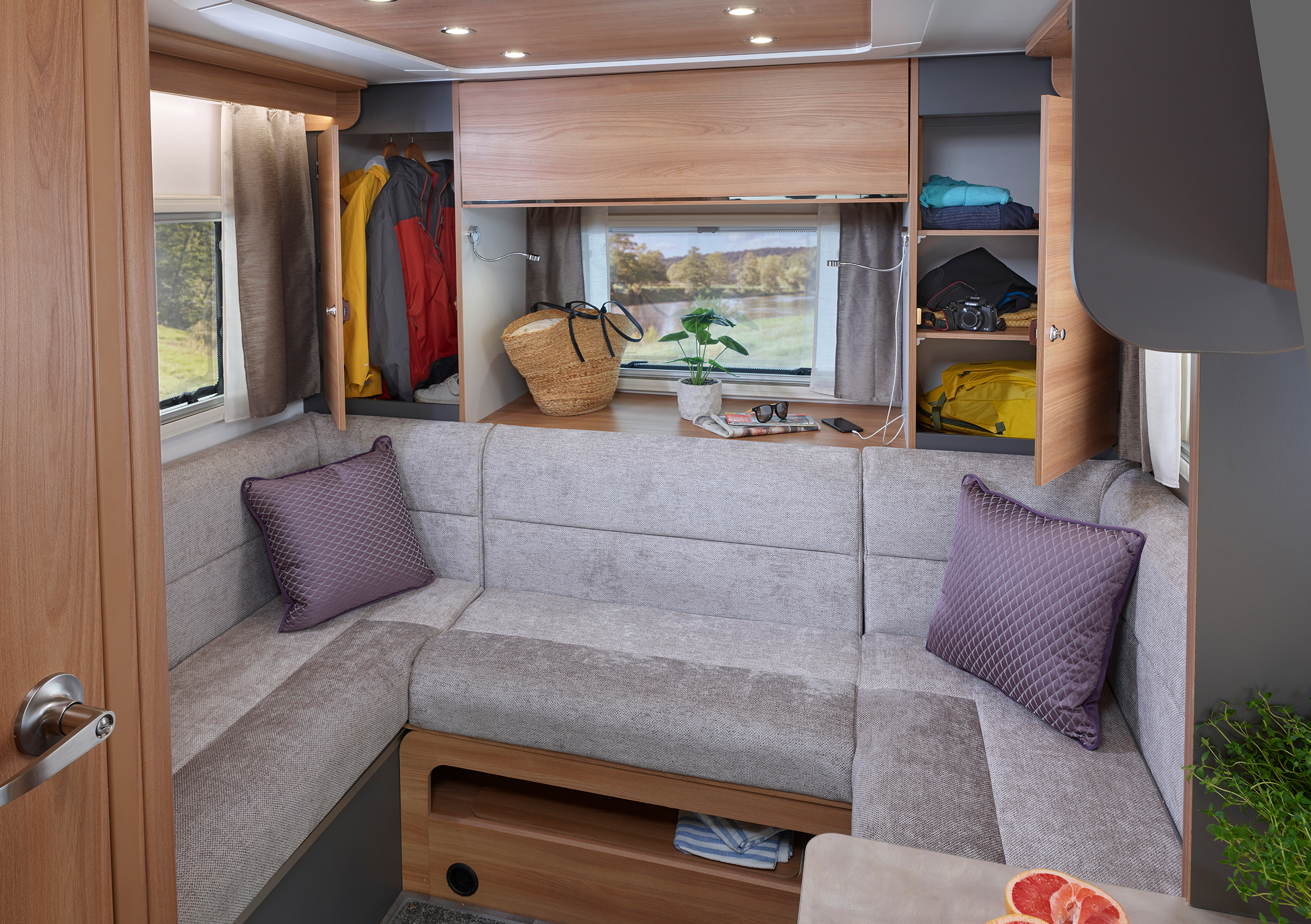 Adamo 75-4DL rear lounge featuring domestic style sofe seating with premium quality fabrics